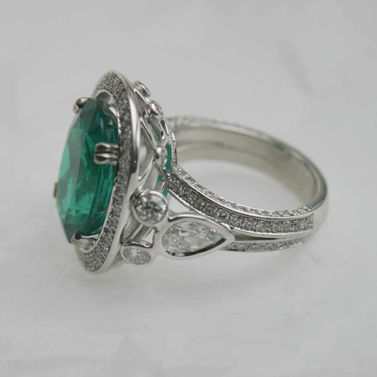 Oval Emerald Entourage Ring with Pavé-Set and Side Diamonds