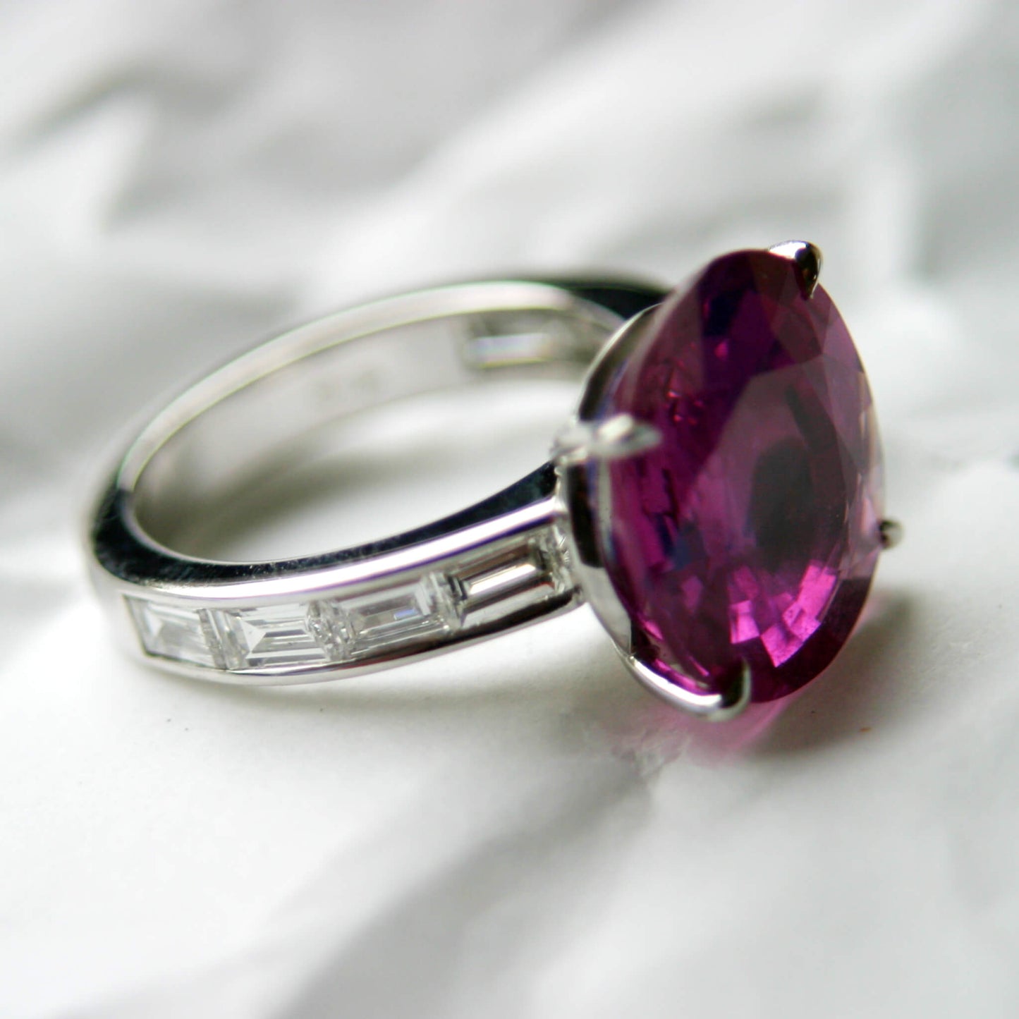 Solitaire Ruby Ring with Baguette Diamond Band