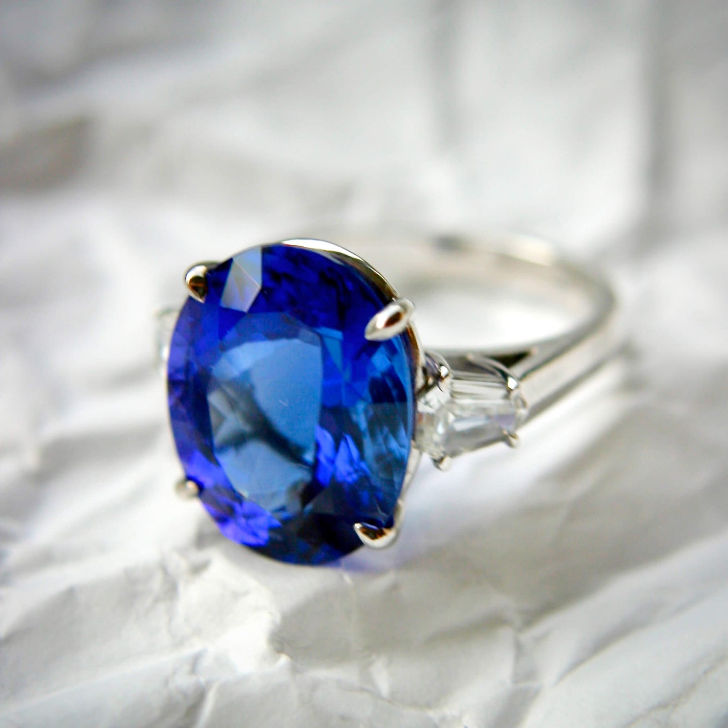 Sapphire Solitaire Ring with Trapeze-Cut Diamonds