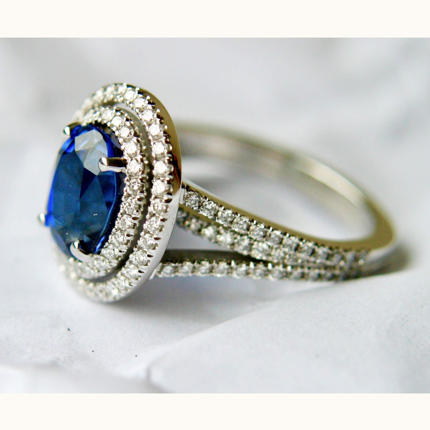 Oval Sapphire Entourage Ring with Castle-Set Diamonds
