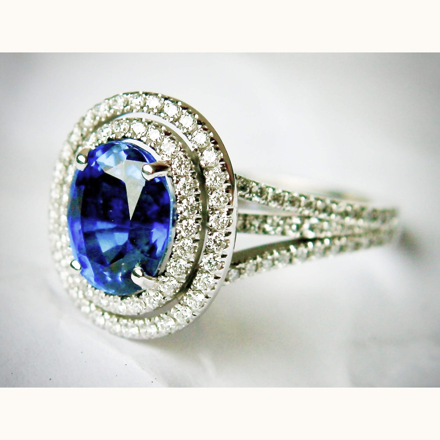 Oval Sapphire Entourage Ring with Castle-Set Diamonds