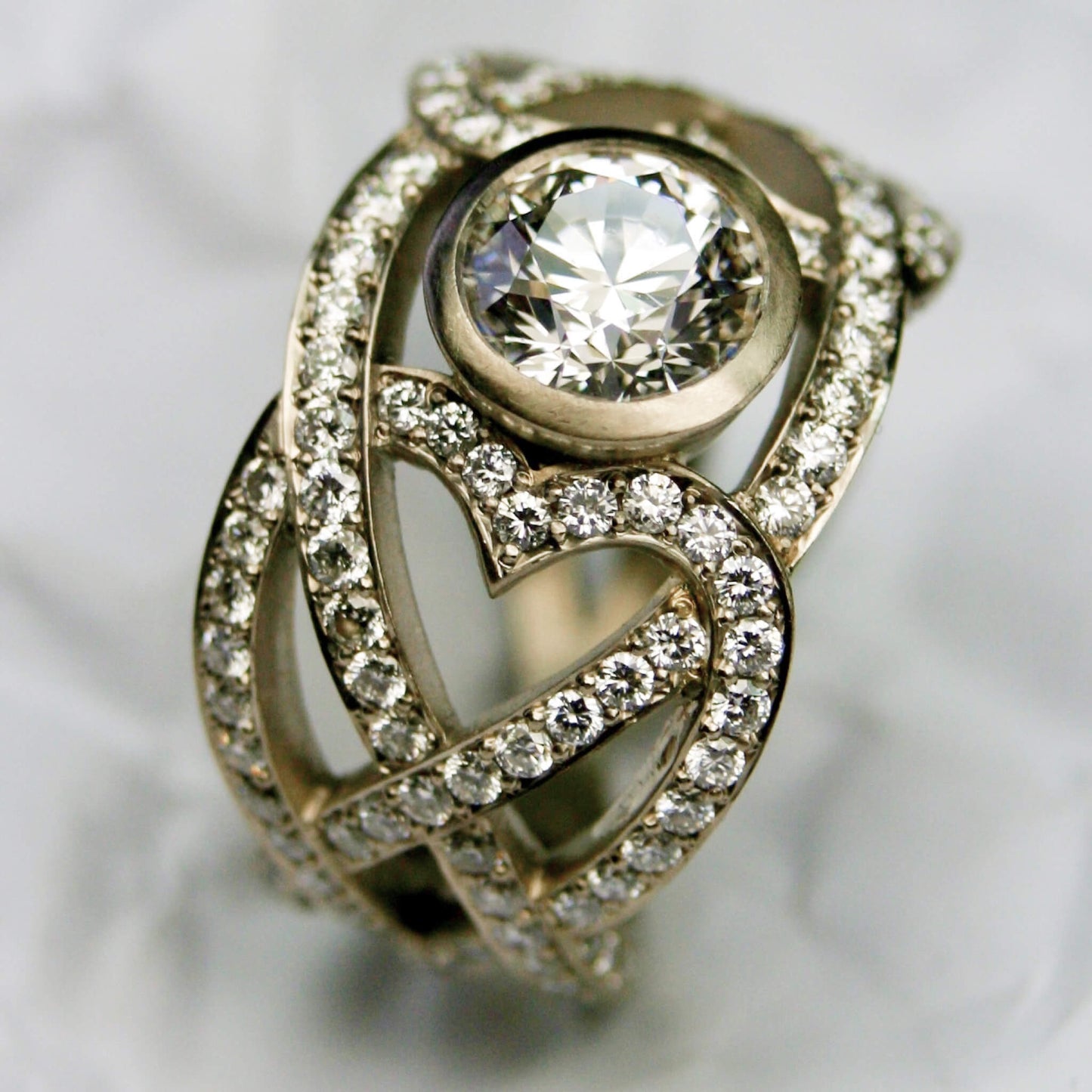 Diamond Pavé Ring with Bezel-Set Center