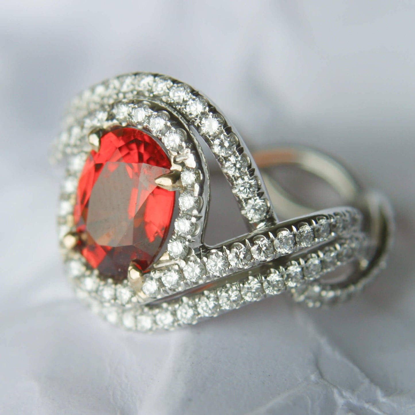 Twist Entourage Ring with Deep Orange Sapphire and Diamond Accents