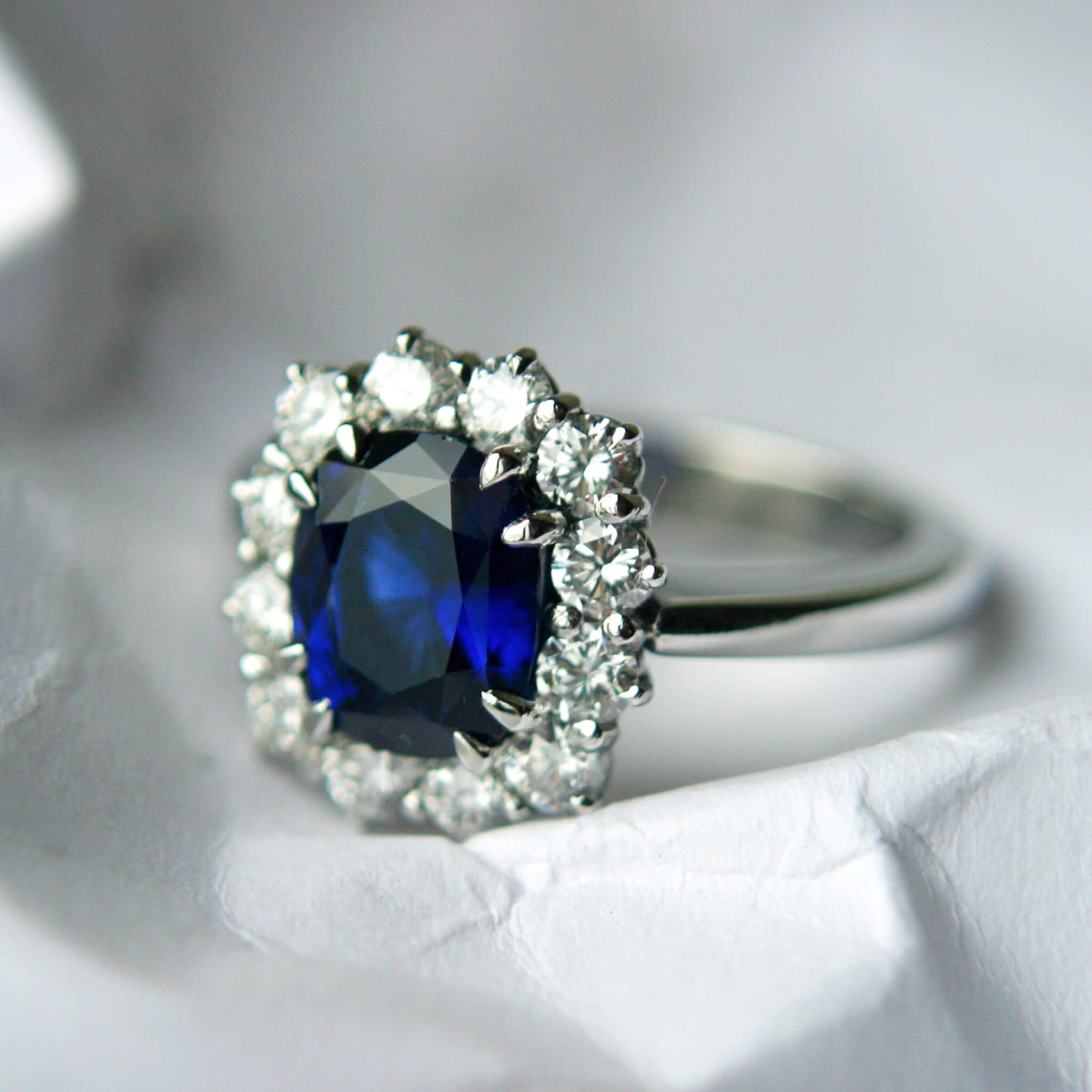 Oval-Cut Sapphire Entourage Ring with Brilliant-Cut Diamonds