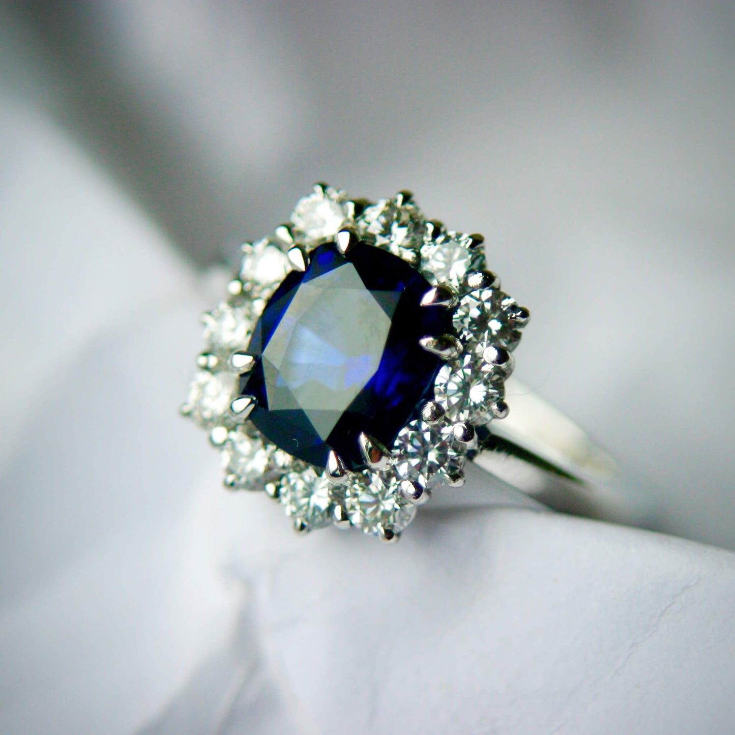 Oval-Cut Sapphire Entourage Ring with Brilliant-Cut Diamonds