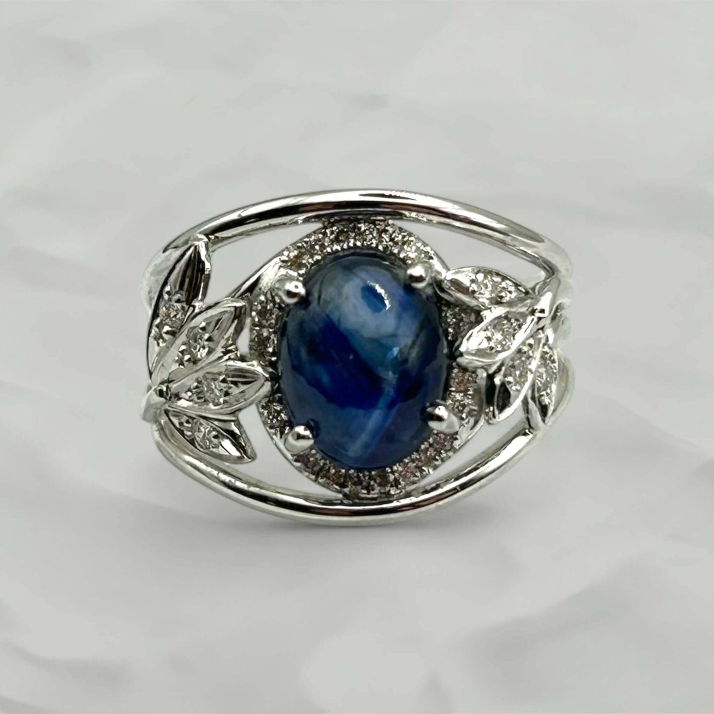 Cabochon Sapphire Ring with Diamond Leaf Motif