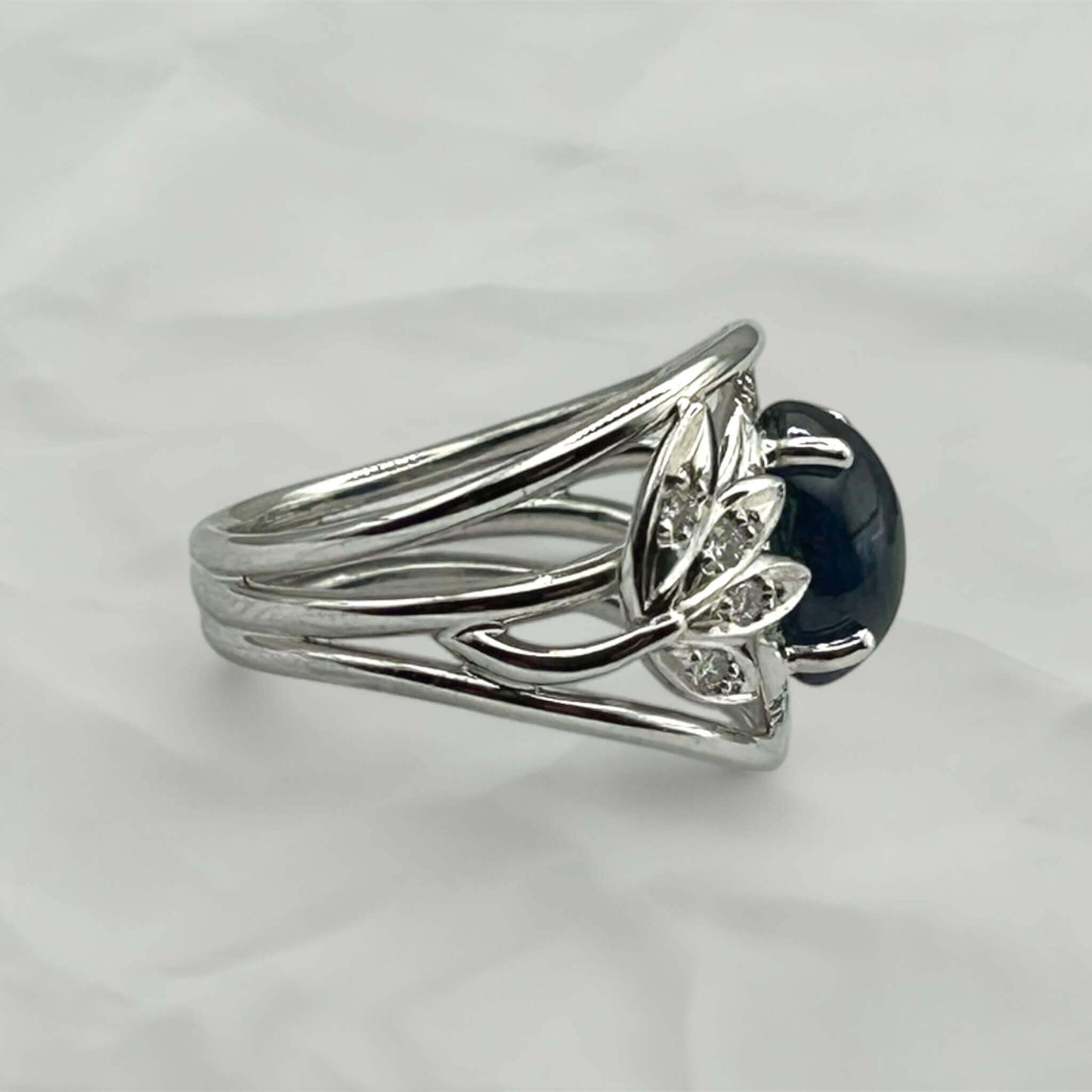 Cabochon Sapphire Ring with Diamond Leaf Motif