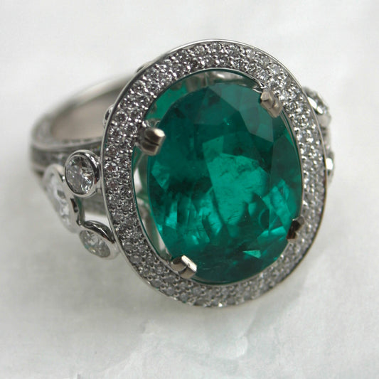 Oval Emerald Entourage Ring with Pavé-Set and Side Diamonds