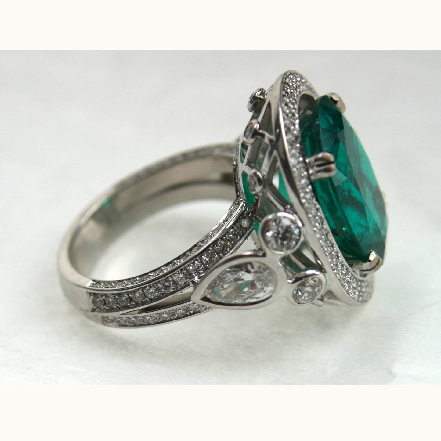Oval Emerald Entourage Ring with Pavé-Set and Side Diamonds