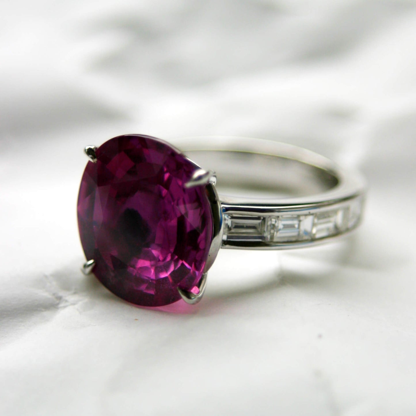 Solitaire Ruby Ring with Baguette Diamond Band