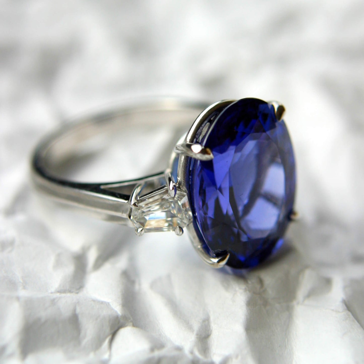 Sapphire Solitaire Ring with Trapeze-Cut Diamonds