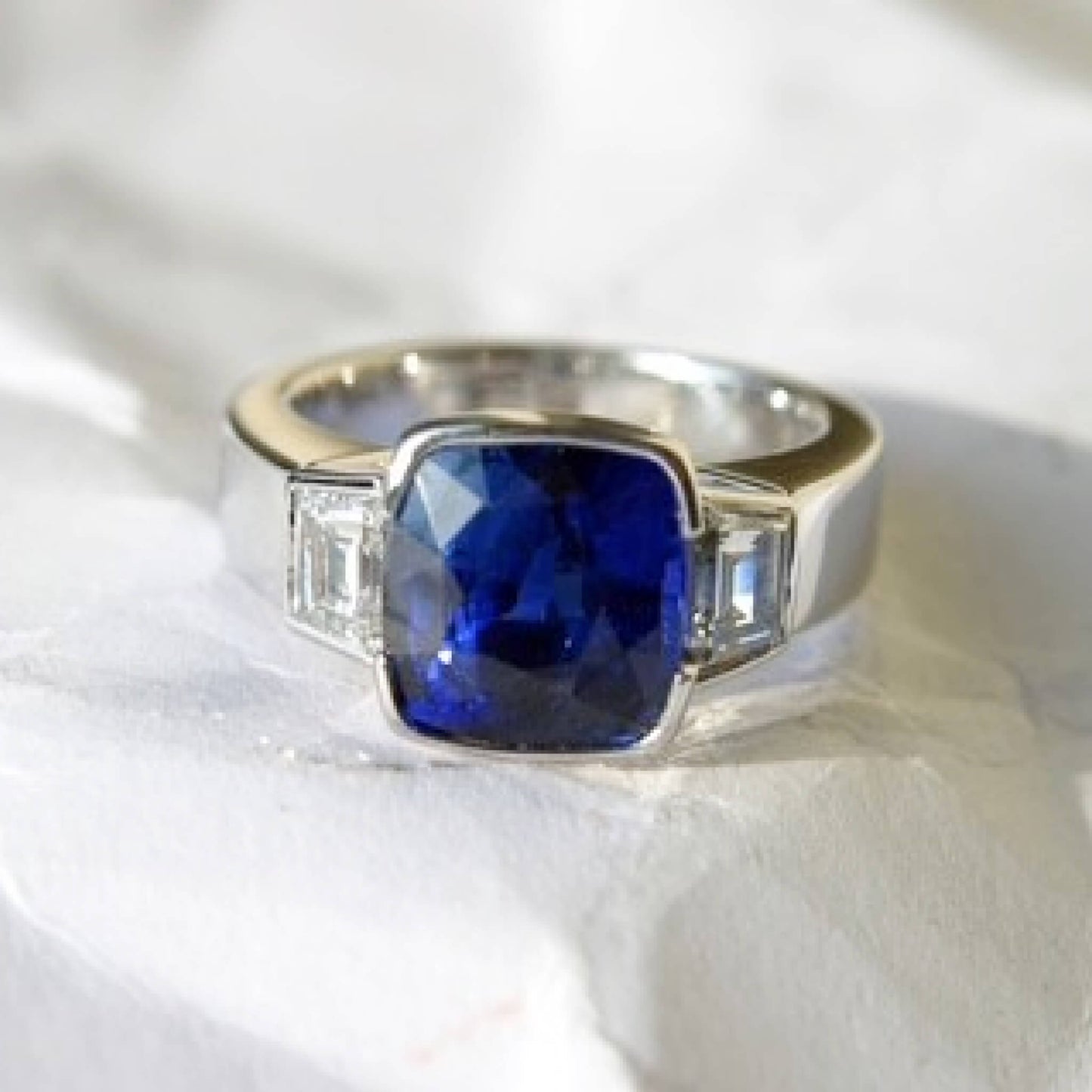 Sapphire Solitaire Ring with Tapered Side Diamonds